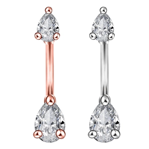 Close-up of rose gold and silver belly rings featuring pear-shaped cubic zirconia gems
