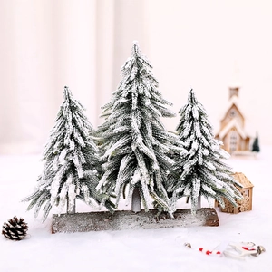 Mini snowy Christmas tree trio on a rectangular wood base for winter tabletop decor
