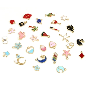 Set of 30 colorful enamel charms with various heart, star, and animal shapes for DIY jewelry