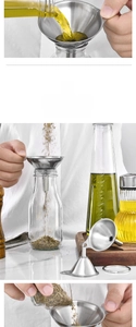 Detail showing stainless steel funnel set pouring olive oil into a glass bottle