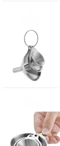 Detail of stainless steel funnel set featuring integrated handle and ring connector