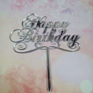 Silver mirror acrylic Happy Birthday cake topper closeup with glossy reflective finish