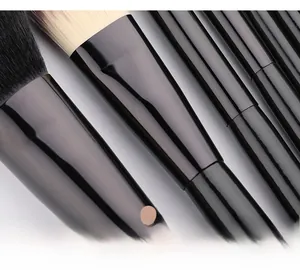 Detail of high-gloss black aluminum ferrules and premium bristles of makeup brushes