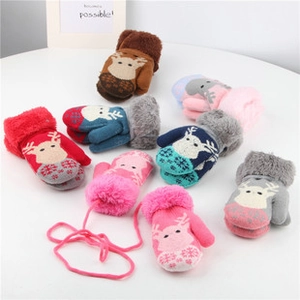 Children's knitted mittens with reindeer pattern and faux fur cuffs in multiple colors