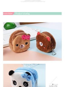 Detail view of plush cartoon bear and panda coin purses with decorative bows and metal chains