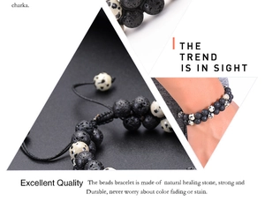 Detail of double-layer woven lava stone bracelet with natural black and white beads