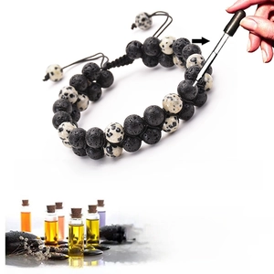 Adjustable lava and spotted stone bracelet detail showing essential oil aromatherapy use