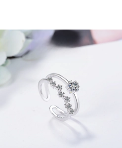 Macro detail of S925 silver double layer ring with snowflake stone and star zircon