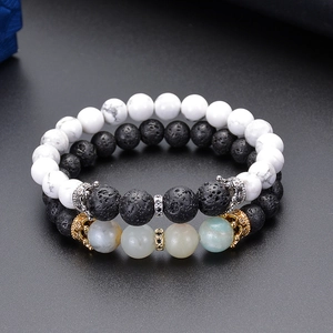 Natural white turquoise and lava stone crown bracelets set for couples in high detail