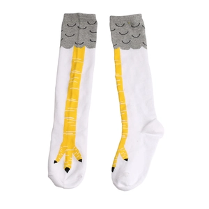 Close-up of white over-knee socks with yellow chicken feet print and gray scale details