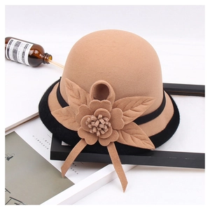 Elegant camel wool felt cloche hat with floral detail and black faux fur trim