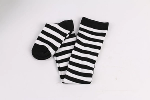 Folded view of black and white striped over-knee socks for cosplay and daily fashion