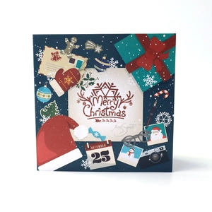 3D handmade pop-up Christmas card with Merry Christmas lettering on a deep blue background