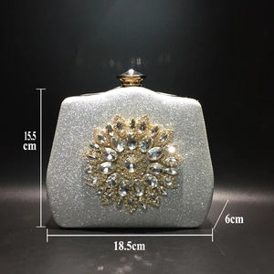 Silver glitter evening clutch with floral crystal clasp and dimensions 18.5x15.5x6cm