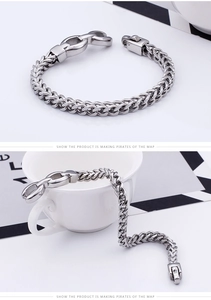 Detailed close-up of a silver Franco chain bracelet featuring a heavy duty metal clasp