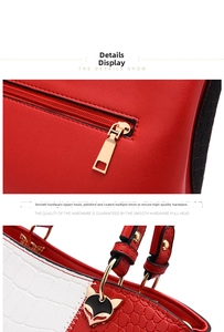 Detail of red crocodile texture bag with gold fox charm and premium metal hardware