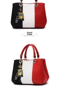 Macro detail of tricolor patchwork tote with crocodile pattern and COPI ribbon