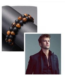 Detail view of double-layered tiger eye and matte black stone beaded bracelet for men
