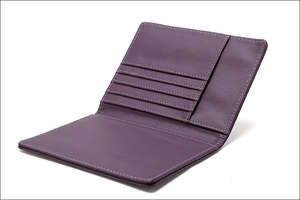 Internal layout of purple RFID passport holder with multiple card slots and leather texture