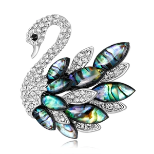 Silver swan brooch with sparkling crystals and colorful abalone shell wing inlays
