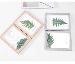 Detail of multi-angle foldable wood texture 5x7 photo frame with metal hinge mechanism
