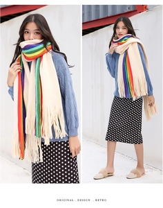 Close-up and full view of a beige knit scarf with vibrant rainbow stripes and tassel edges
