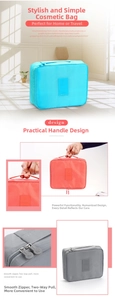Detailed view of durable travel cosmetic bag with sturdy handle and dual metal zippers