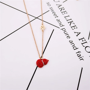 Rose gold necklace with red crystal gourd pendant and small coin charm accessory