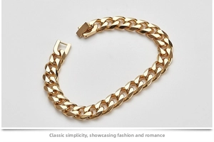 Detailed view of polished gold-plated Cuban link bracelet with flat chain and secure box clasp