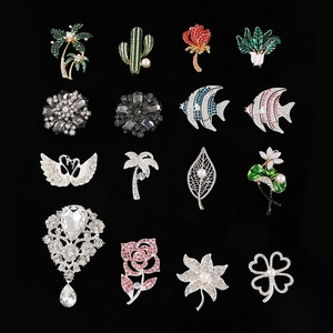 16-piece set of DIY alloy brooches with rhinestones and pearls in a 4x4 grid layout