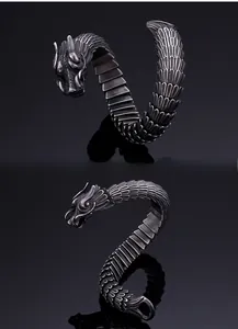 Detailed macro view of vintage dragon scale texture and realistic silver dragon head bracelet