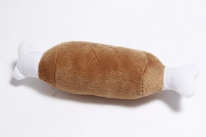 Detail showing the plush texture and stitched seams of the bone-shaped dog toy
