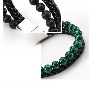 Macro shot of lava stone beads and green striped beads on braided magnetic bracelets