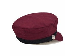 Detail of wool octagonal newsboy cap in burgundy with black braid and silver anchor button
