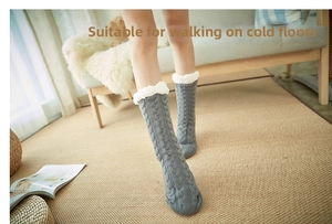 Thick grey cable-knit slipper socks with warm faux fleece lining for indoor home comfort