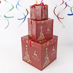 Three-piece red Christmas gift box set with golden reindeer and silk ribbon decoration