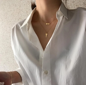 Elegant 925 silver double layer gold necklace featuring a classic key pendant for women