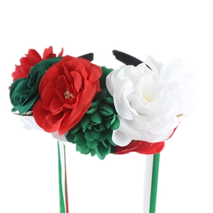 Floral headband with red green and white artificial roses and long ribbons for festivals