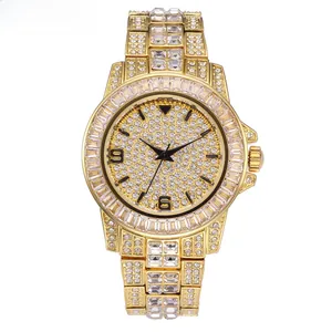 Macro detail of luxury gold-plated watch showing full diamond dial and crystal casing