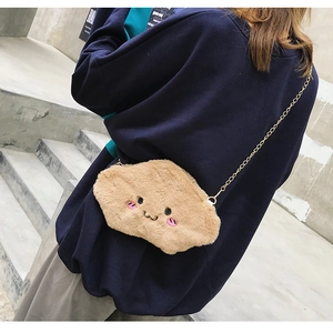 Close-up of soft khaki plush cloud bag with embroidery and gold chain strap