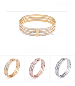 Three-layer titanium steel bangle with diamonds, showing 62mm diameter and 13mm height