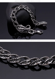 Macro shot of retro dragon head clasp and oxidized stainless steel scale texture links