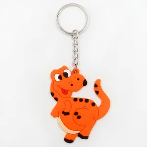 Cute orange cartoon dinosaur keychain with black spots and silver metal ring accessory