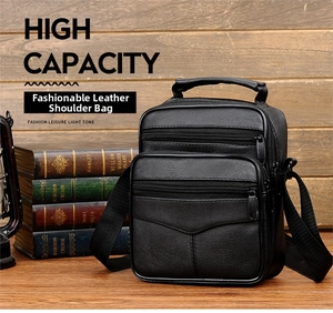 Macro detail of high capacity black genuine leather business bag with multiple compartments