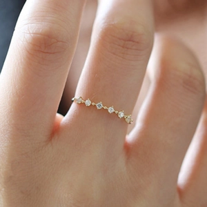 Minimalist S925 sterling silver 14K gold plated ring with seven round cubic zirconia stones