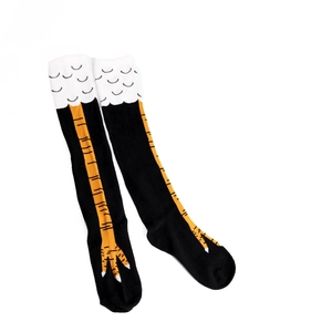 Close-up of black cotton over-knee socks featuring creative orange chicken feet patterns