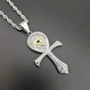Silver Ankh pendant with gold Eye of Horus and sparkling crystals on twist chain