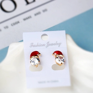 Sparkling zircon snowman earrings with red Christmas hats in elegant gold finish