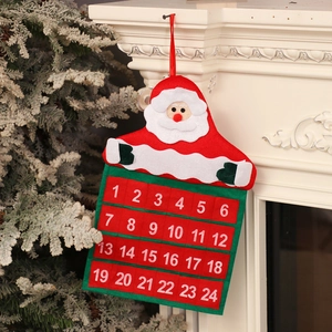 Velvet Santa Advent Calendar with 24 numbered red pockets hanging on a fireplace mantel