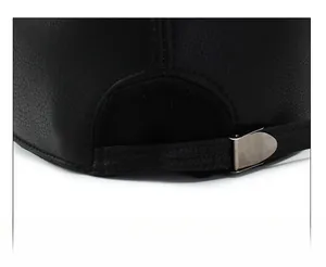 Detail of adjustable PU leather back strap with silver metal buckle on winter baseball cap